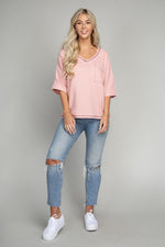 Pocket v neck top with contrast stitch