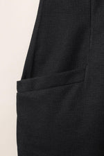 Textured Black Sleeveless V-Neck Pocketed Jumpsuit