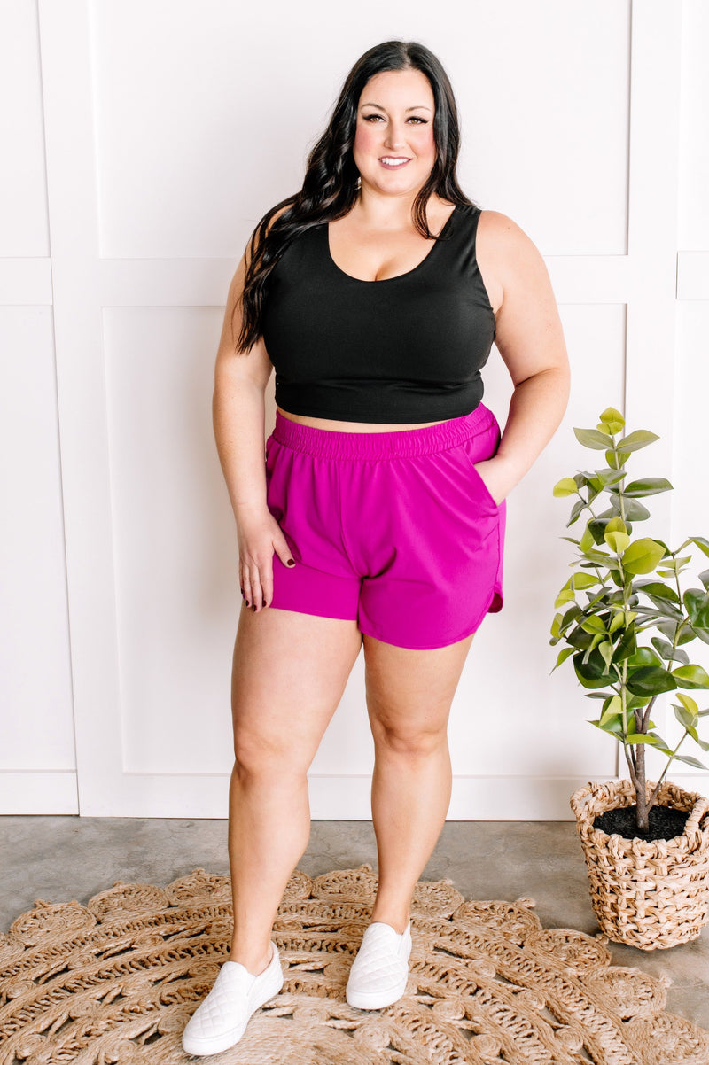 Athletic Flowy Shorts With Pockets In Bright Fuchsia