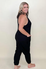 Textured Black Sleeveless V-Neck Pocketed Jumpsuit